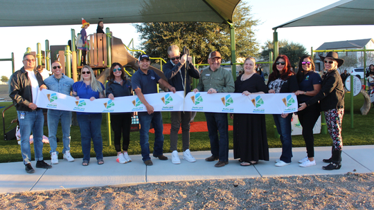 Kyle celebrates Waterleaf playground opening