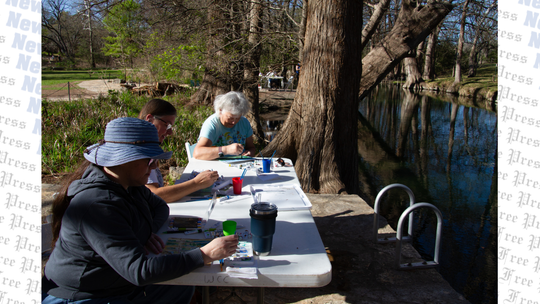 Locals paint at Blue Hole Regional Park