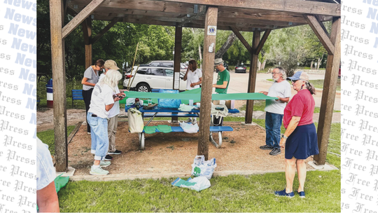 Wimberley locals hang green ribbons, honor flood victims
