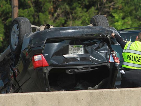 Authorities seek man who fled I-35 rollover wreck