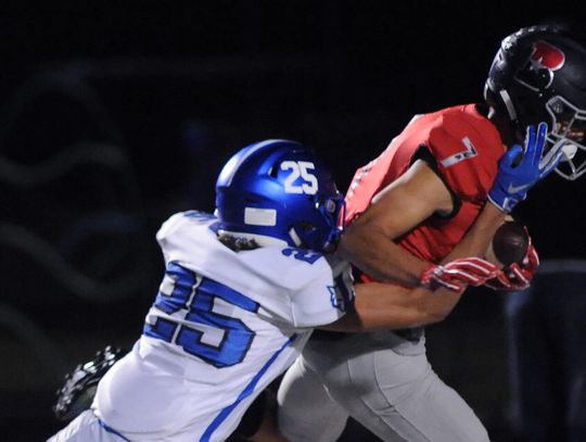 Bowie rolls by Lobos 65-21