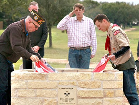 Buda Boy Scout completes flag retirement project