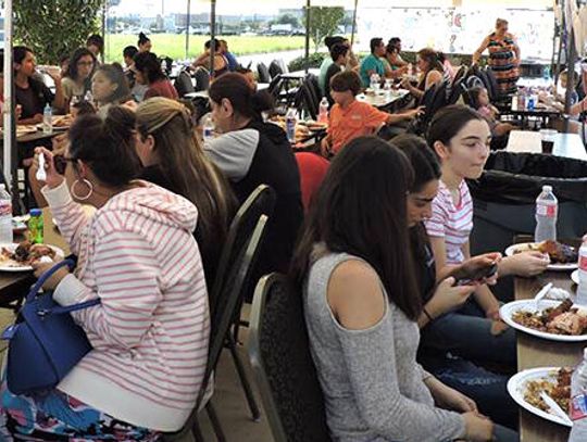 Buda-ites welcome Harvey evacuees with a hot meal