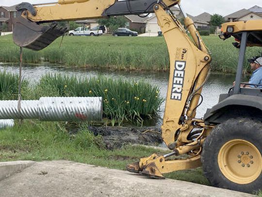 Buda teams up to fix a dam problem