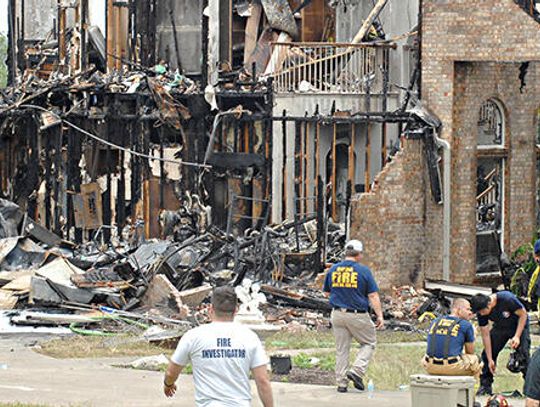 Buda woman dies in house fire