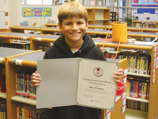 Buda youth receives Red Cross medal for lifesaving efforts
