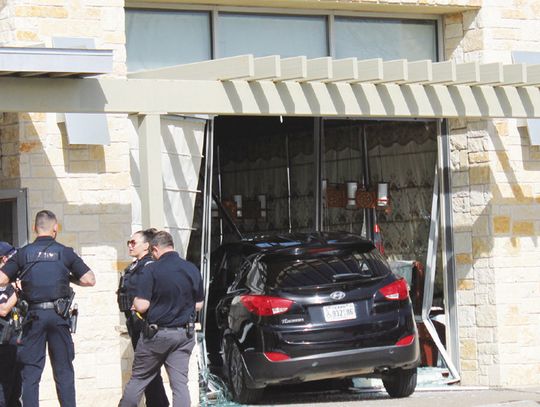 Car crashes into Koy restaurant