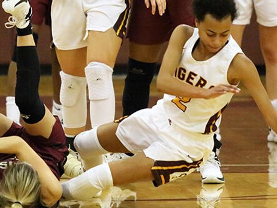 Catching fire  Lady Tigers roll past Rouse 46-33