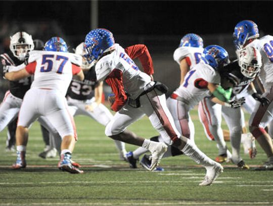 Cavs football cruises past Rebels 59-27 