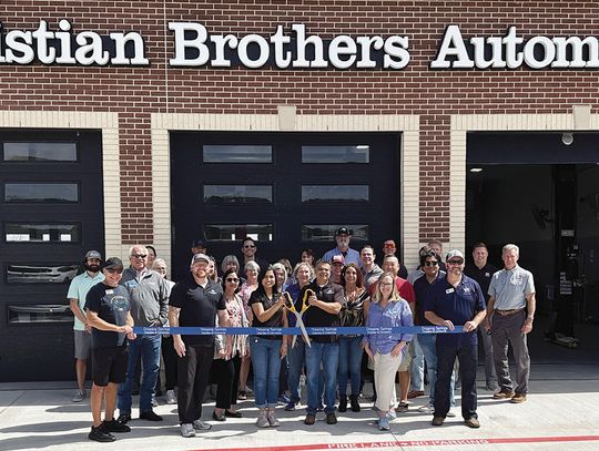 Christian Brothers Automotive cuts ribbon with Dripping Springs Chamber of Commerce