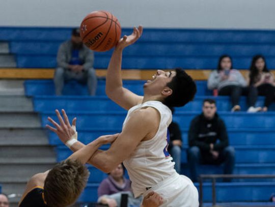 Clutch free throw shooting propels Rebels to victory