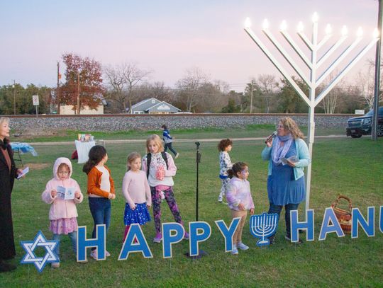 Community gathers for last night of Hanukkah