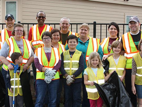 Community members host road cleanup in name of fallen marine
