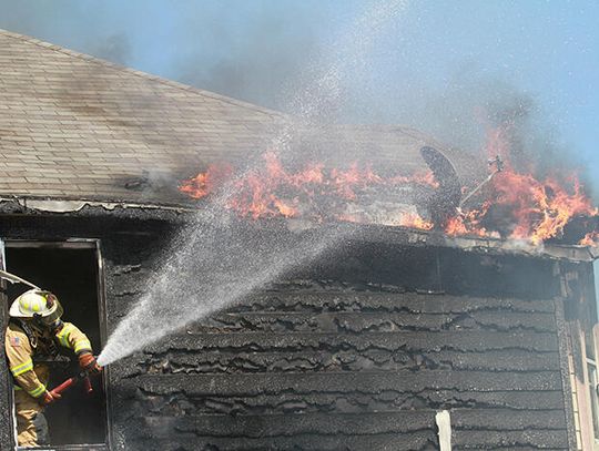 Crews battle house fire in west Kyle