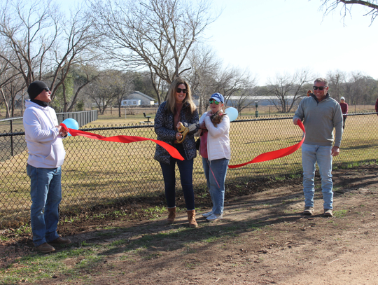 Dogs, owners celebrate new Buda amenity