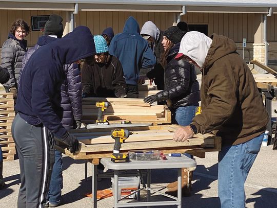 DSHS students, moms build beds for children in need