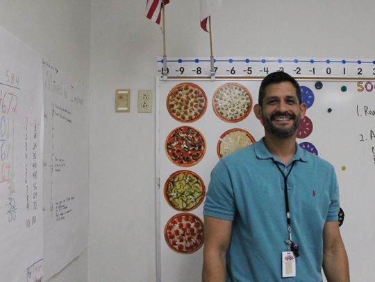 Elementary math teacher connects with students with classroom store