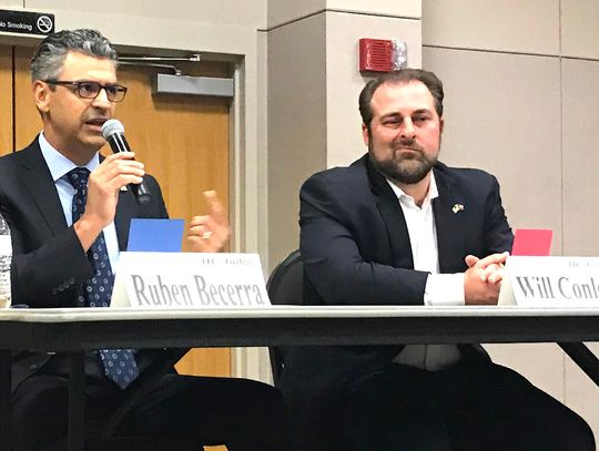 Expertise, debt focus of county judge debate