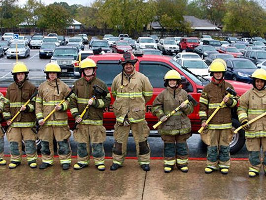 Fighting fires and hitting tires: Students get hands-on experience with HCISD fire academy