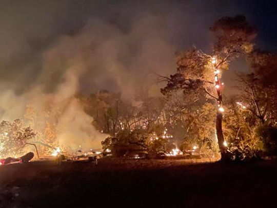 Firefighters battle two wildfires