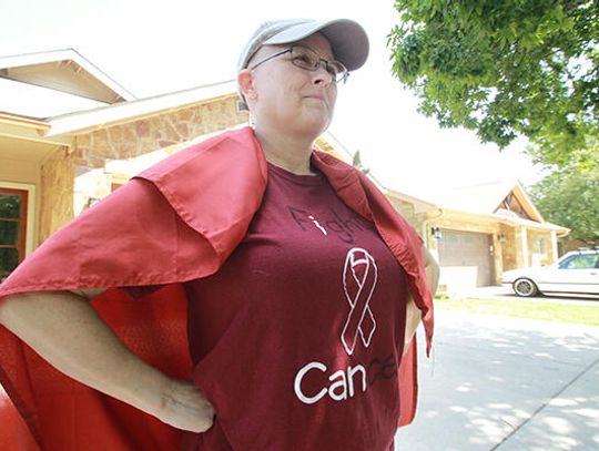 Flying courage: Neighbors rally in support of Hays CISD educator
