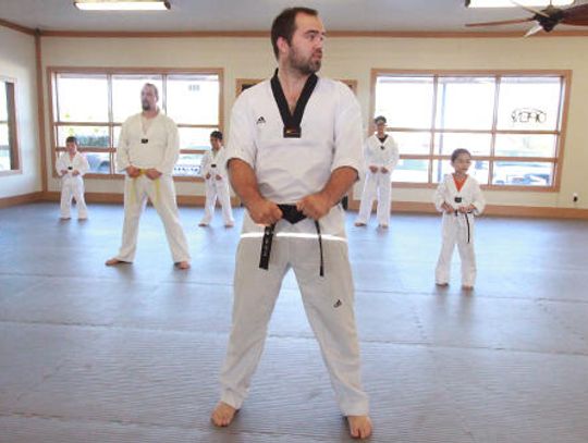 From Korea with love: Martial arts masters bring taekwondo to Kyle studio