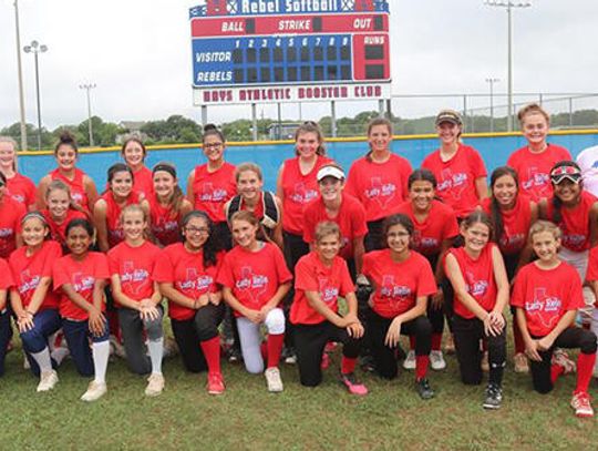 Having a ball at Rebel softball camp