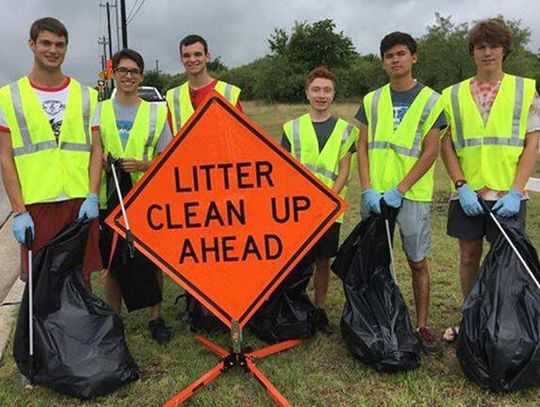 Hays band members clean up adopted highway