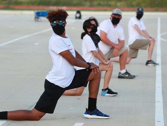 Johnson High Jaguar band masks up for new season