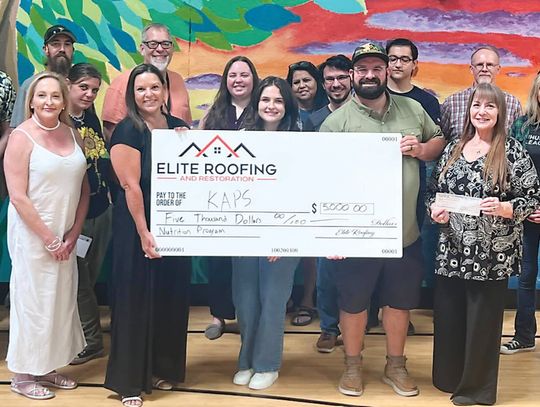 Katherine Anne Porter School receives donation check