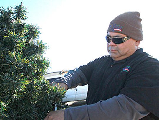 Kyle employee finds his way by giving back to his community