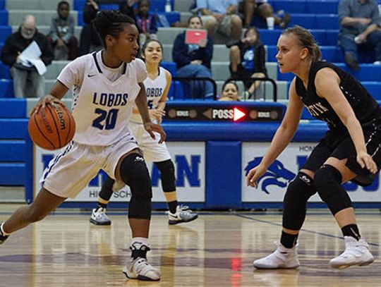Lady Lobos lose battle to Maroons, 38-14