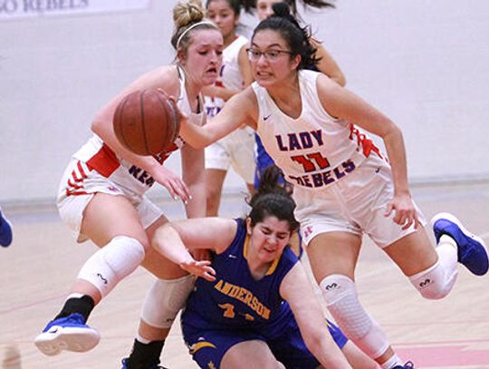 Lady Rebs smack down Trojans 64-37