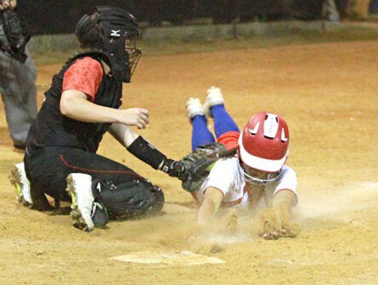 Lady Rebs take winning opener over Lake Travis