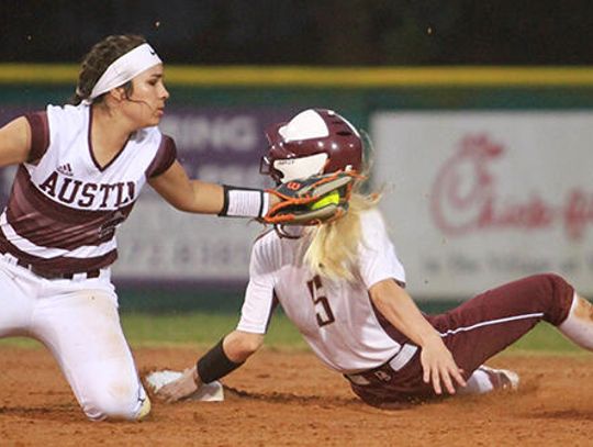Lady Tigers survive Austin in three