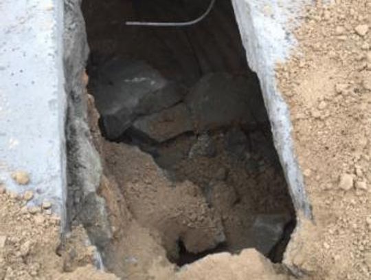 Large hole forces Kyle to close low water crossing along Lehman Road