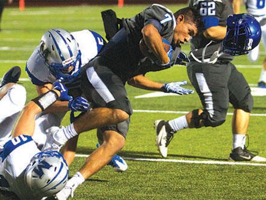 Lobos fall to McCallum 55-17 in home opener
