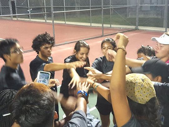 Lobos outlast Rebs in six hour tennis duel