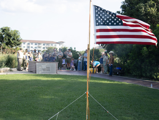 Local Scouts learn about tradition at flag retirement