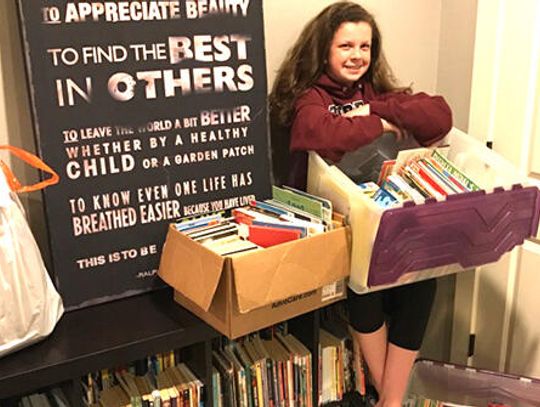 Local student turns the page on book drive