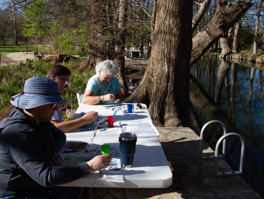 Locals paint at Blue Hole Regional Park