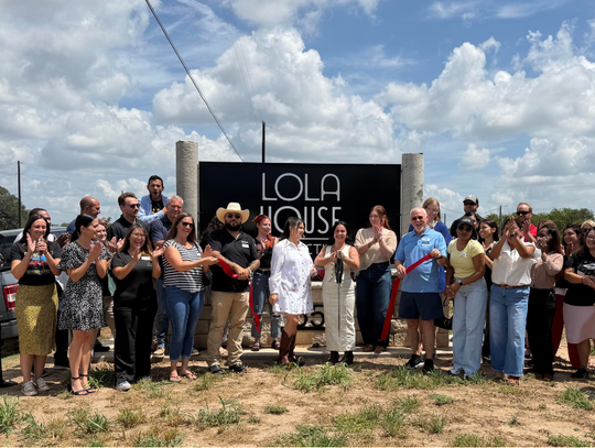 Lola House Collective celebrates with ribbon cutting