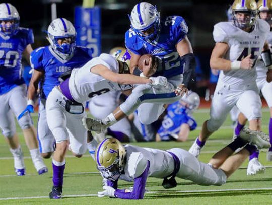 Mustangs outlast Lobos in overtime