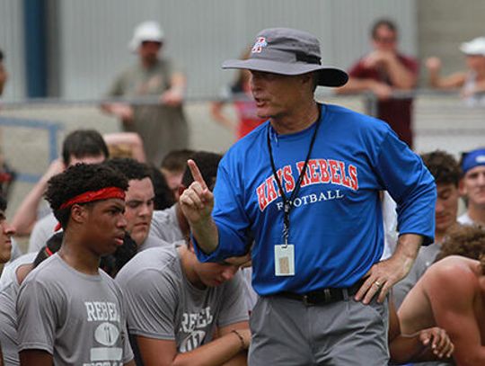 New coach, new season, new look  as Rebel football readies for Slot-T