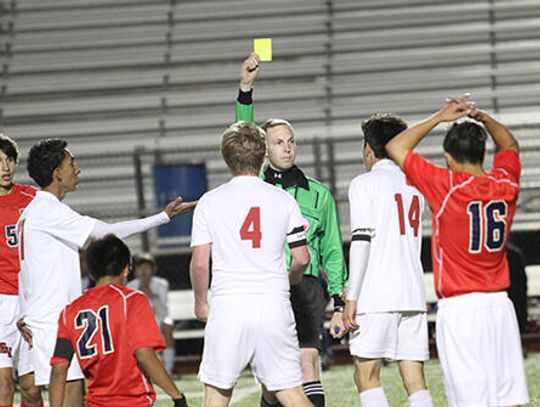 Not throwing in the towel: Local refs staying on the field