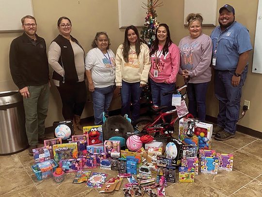 PEC employees donate more than 800 toys to area Santa programs