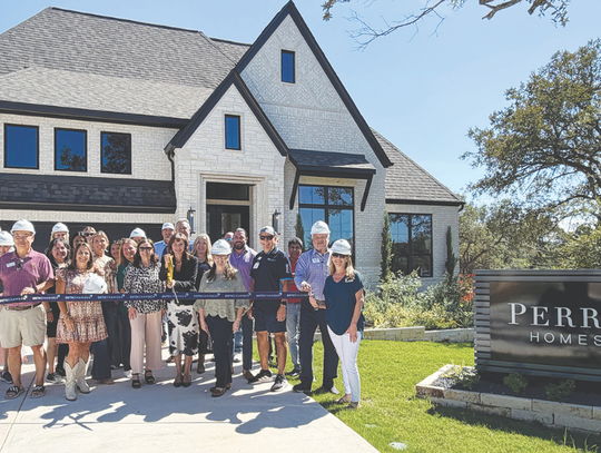 Perry Homes celebrates ribbon cutting at Creek of Driftwood