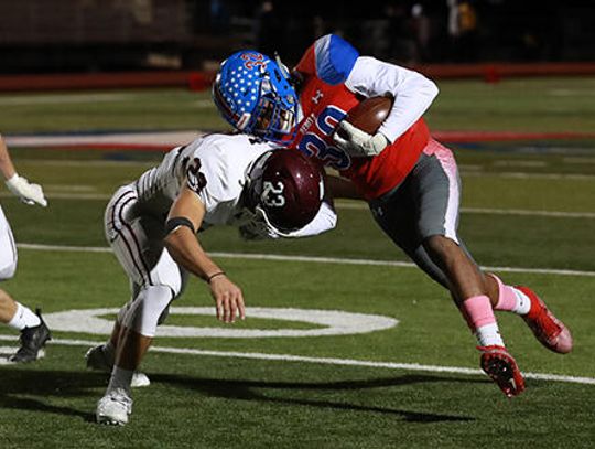 Rebel football goes Green in 69-36 win over Austin