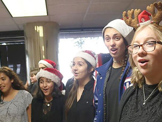 Rebel Jazz choir group spreads holiday cheer
