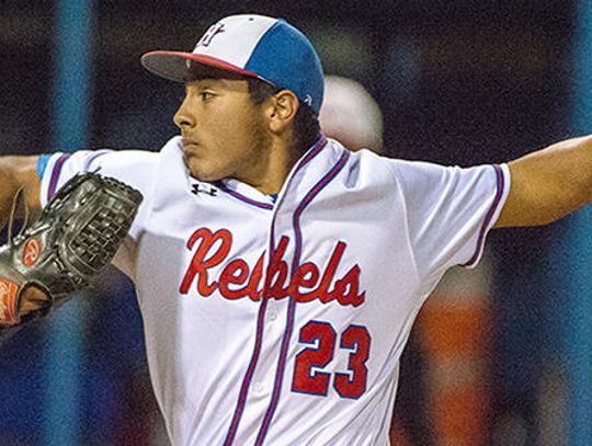 Rebels fall in extra innings